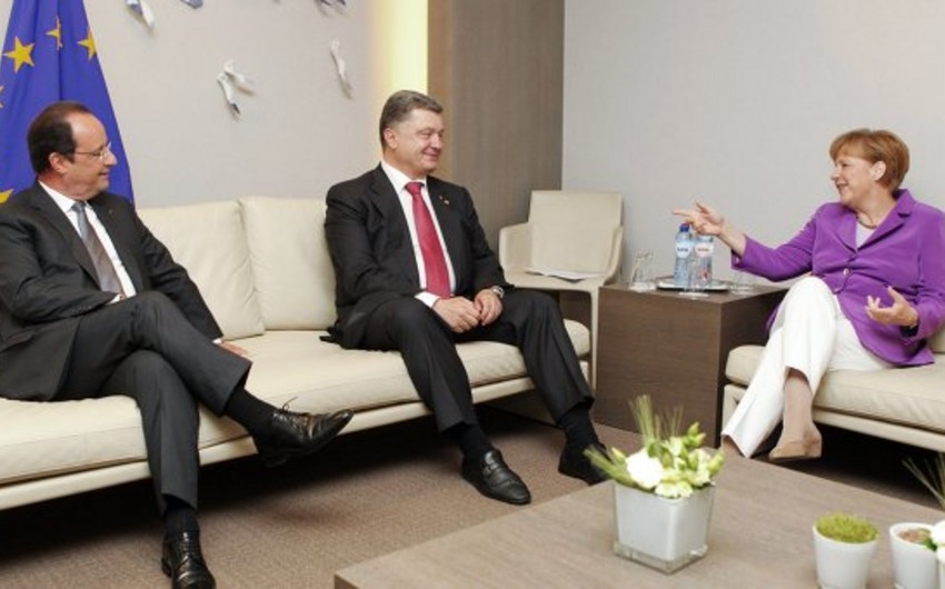 Меркель, Олланд и Порошенко провели встречу перед Маршем единства