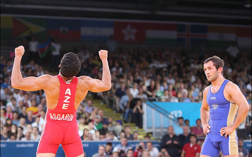 Olimpiada finalında Toğrul Əsgərovla qarşılaşmış güləşçi medaldan məhrum edilib