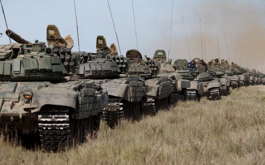 Russia begins to withdraw troops from border region with Ukraine