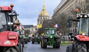 French farmers on tractors protest near European Parliament