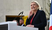 Le Pen threatens to withdraw support from French government over budget disputes