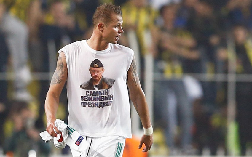 UEFA fines Dmitri Tarasov for Vladimir Putin T-shirt gesture