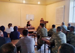 Meeting with servicemen and civilian workers held in one of military units