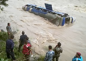 Van falls into river in Pakistan-administered Kashmir, killing 16 people, mostly children