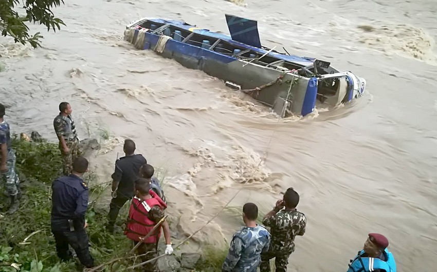 Van falls into river in Pakistan-administered Kashmir, killing 16 people, mostly children