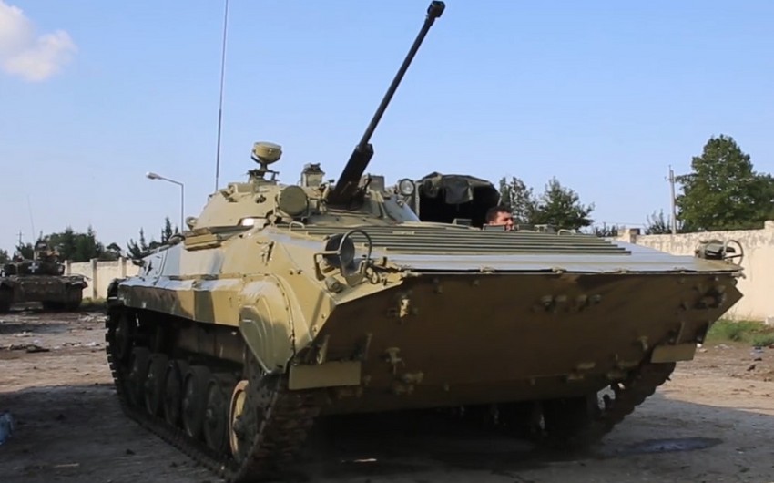 Azerbaijani Army repaints armored vehicles abandoned by enemy