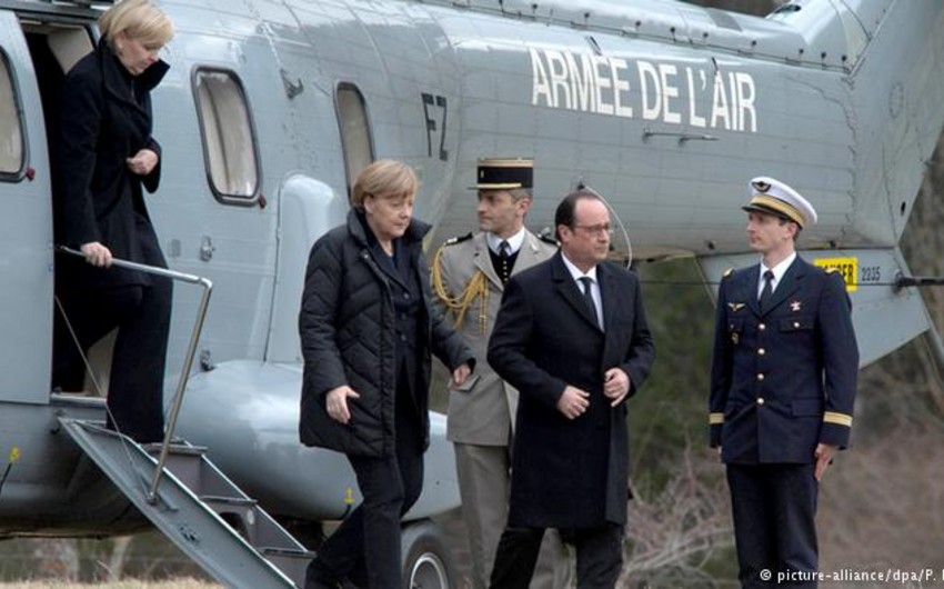 Олланд и Меркель на вертолете облетели район катастрофы А320