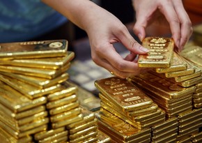 Gold rising amid weakening US dollar