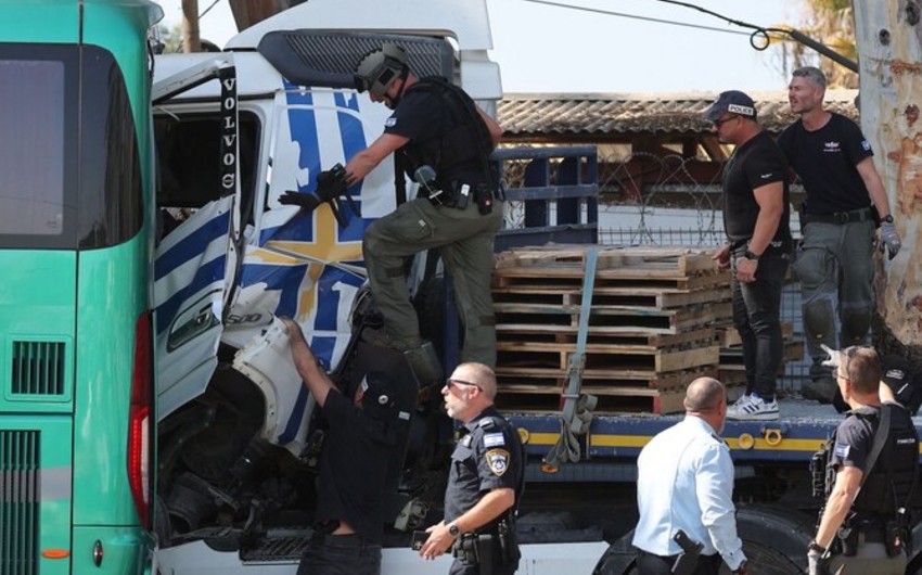 Truck rams into Tel Aviv bus stop, wounding dozens in suspected terror attack