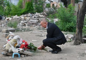 Ilham Aliyev views crime scenes caused by Armenia's missile attacks on Ganja
