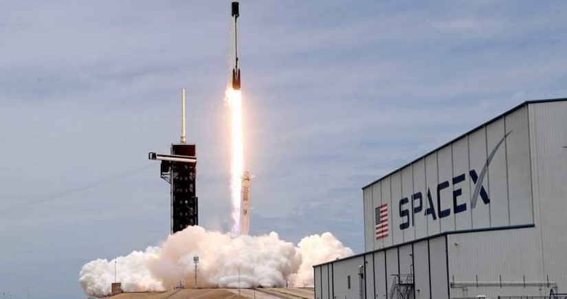 SpaceX rocket launches 53 Starlink satellites into orbit and aces landing at sea