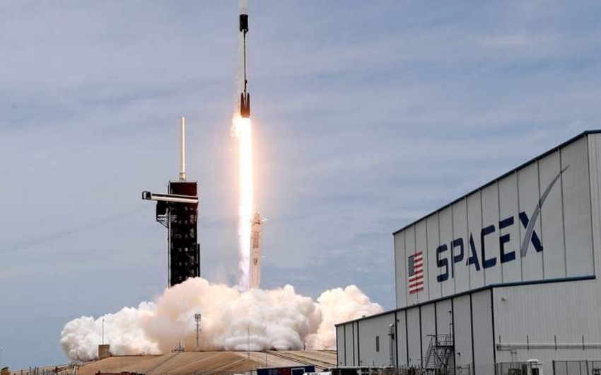 SpaceX rocket launches 53 Starlink satellites into orbit and aces landing at sea