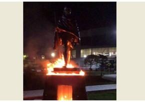 Why was Mahatma Gandhi's statue set on fire in Yerevan?