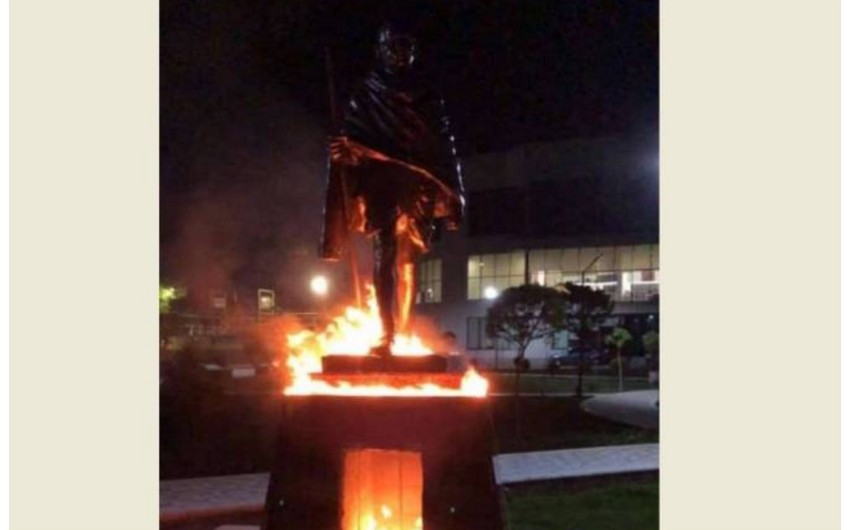 Why was Mahatma Gandhi's statue set on fire in Yerevan?