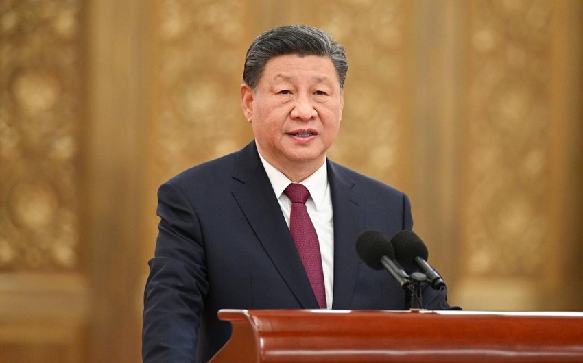 Xi pledges to work with int'l society to build community with a shared future for mankind