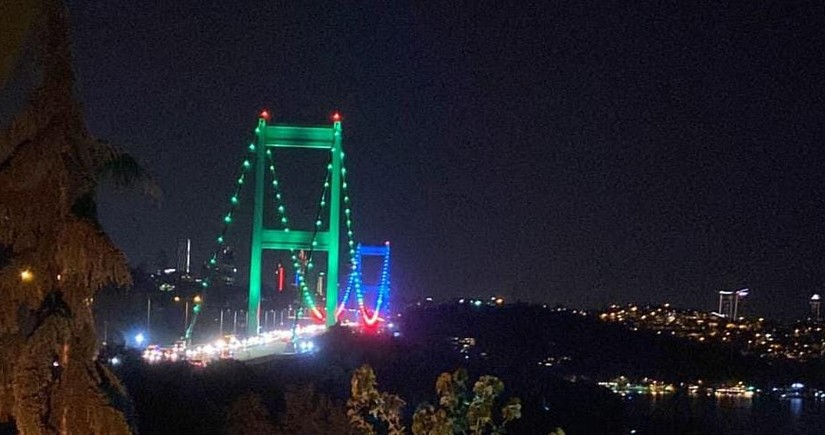 Istanbul's symbols illuminated with colors of Azerbaijani tricolor
