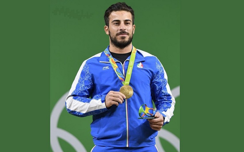 Olympic champion removed from Iranian national team
