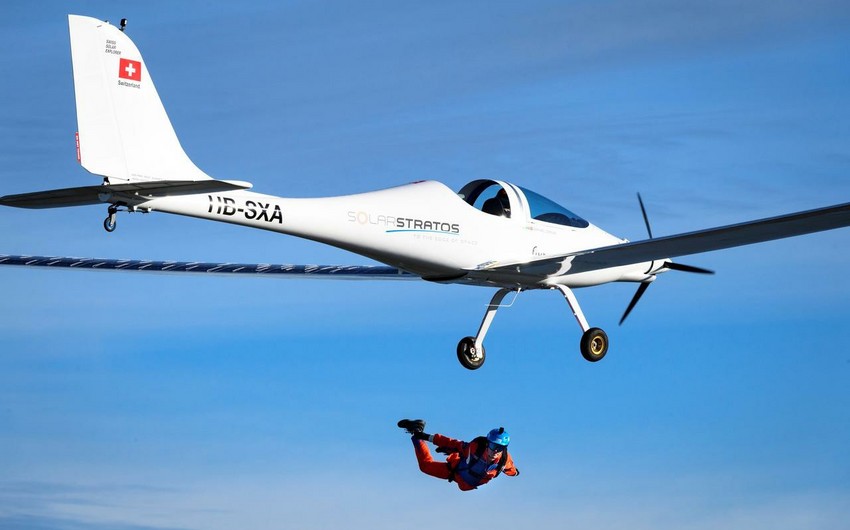 Parachutist makes world's first skydive from solar-powered plane