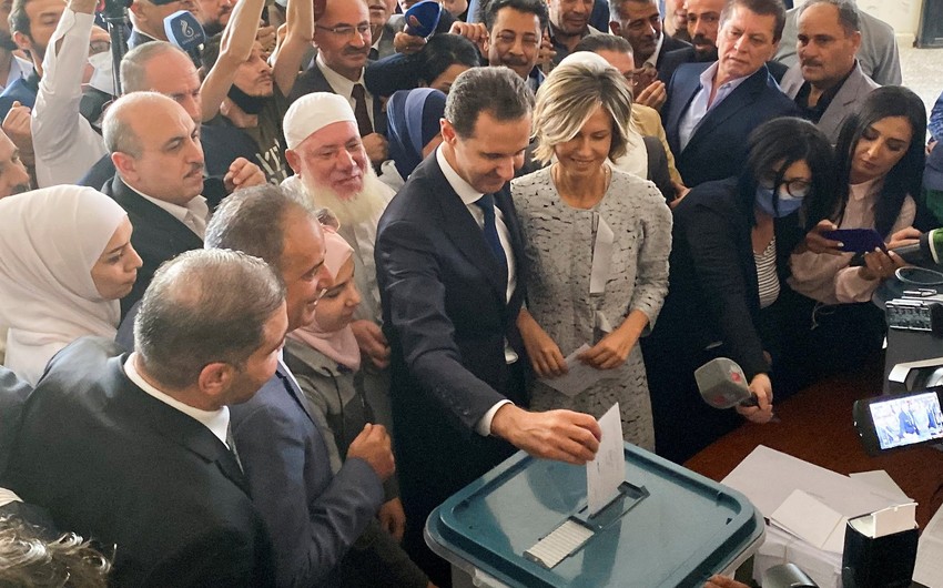 Syrian president votes in parliamentary elections