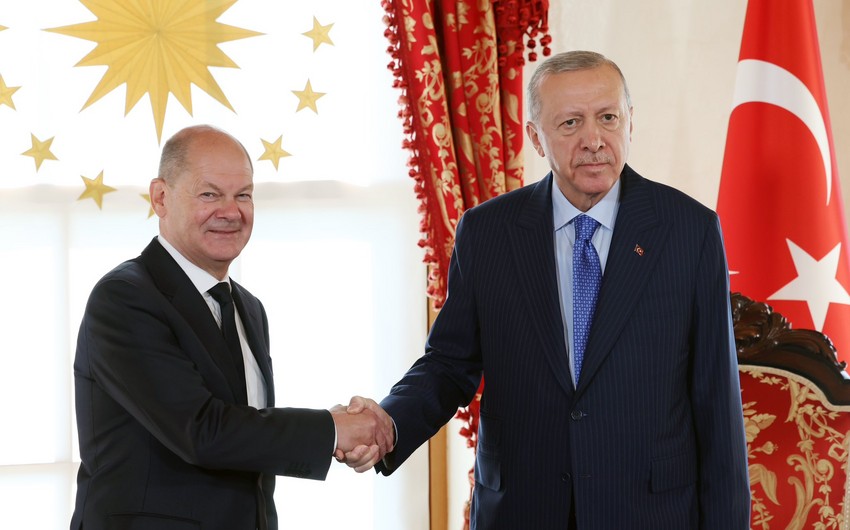 Erdogan receives German chancellor