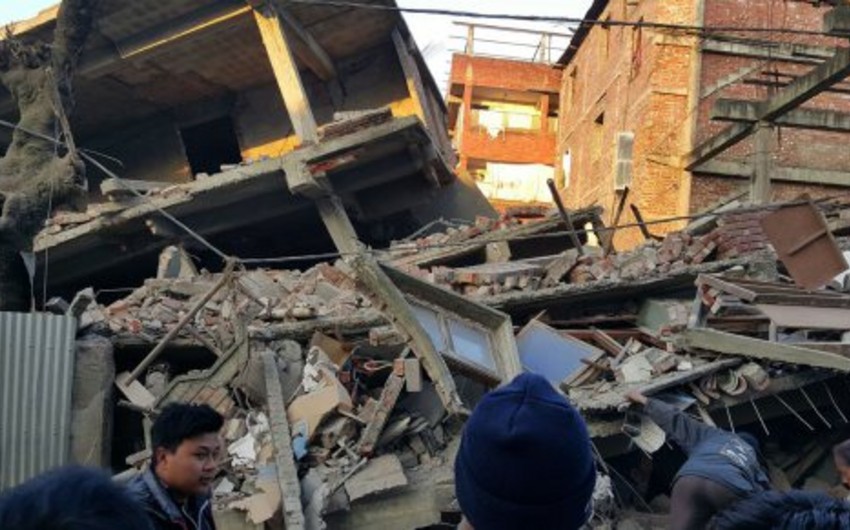 9 killed in building collapse in northeast Pakistan