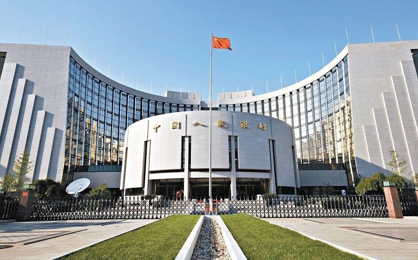 China's central bank cuts two key rates to boost economy