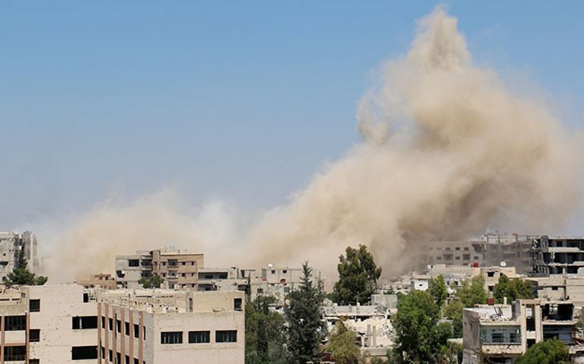 Bəşər Əsəd qüvvələrinin bombardmanı nəticəsində 14 dinc sakin ölüb