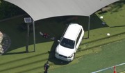 Boy, 11, dead and four other children injured after car crashes into Melbourne school