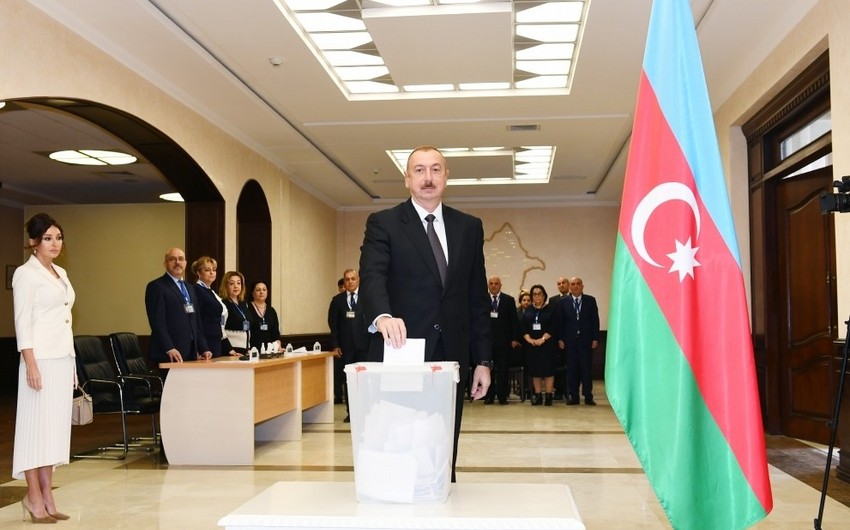 President of Azerbaijan and his family members vote in municipal elections