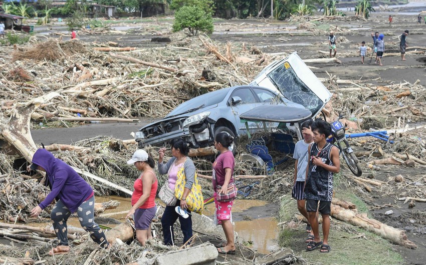 Storm blows away from Northern Philippines leaving 82 dead