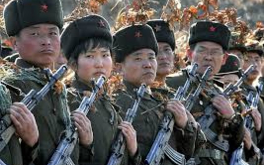 Солдаты КНДР стреляли в фото президента Южной Кореи