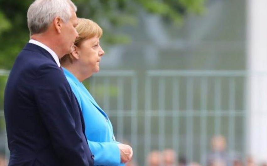 German Chancellor seen shaking in public for third time - VIDEO