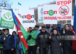 Representatives of local Russian community chanting slogans together with eco-activists on Khankandi-Lachin road