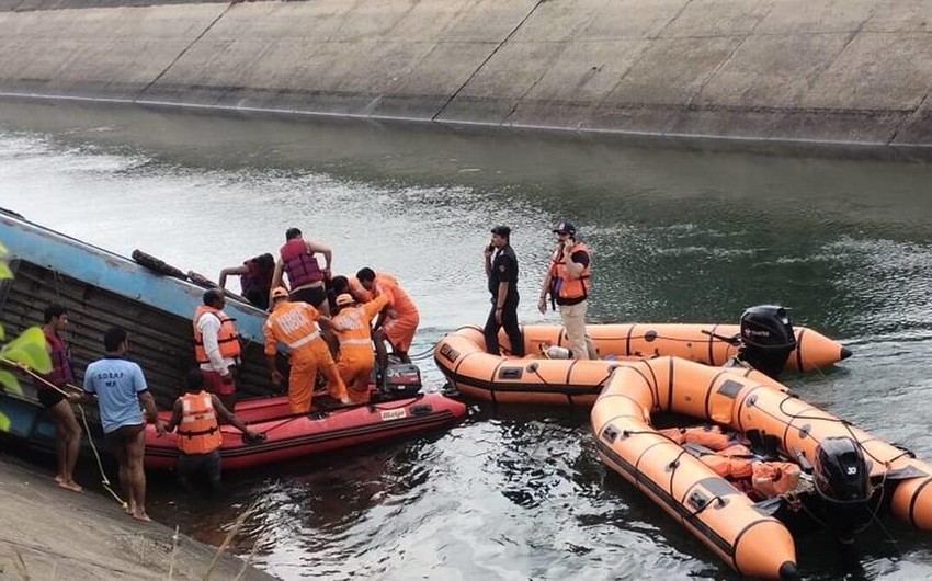 Six people die as bus plunges into river in India