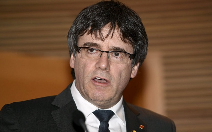 Former Catalan leader Carles Puigdemont surrenders in Belgium